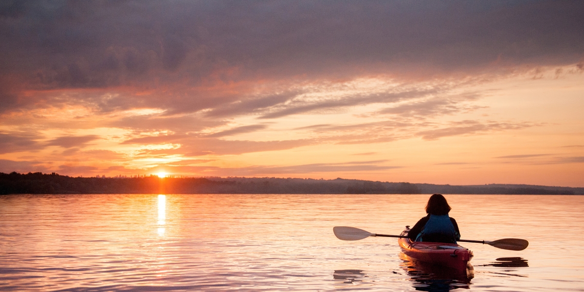 Kayaking into the sunset