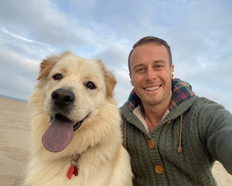 Hanru with his dog Colby.