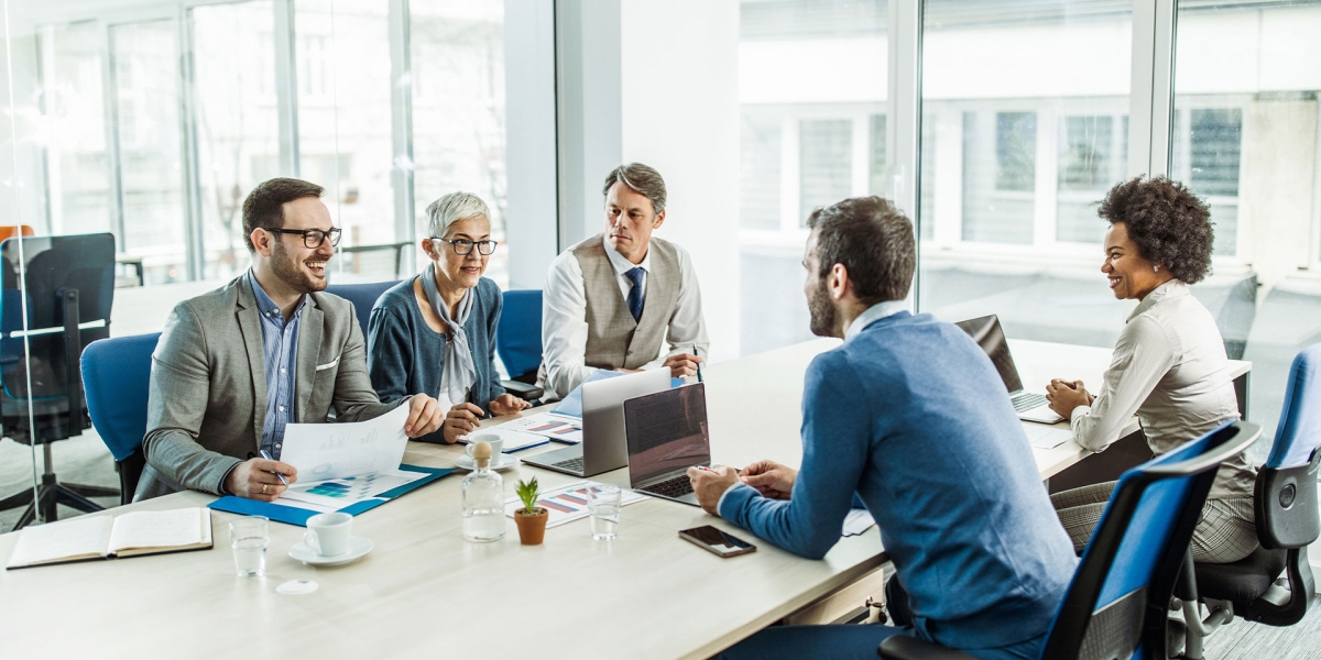 Group of business professionals having a brainstorming session in an office.