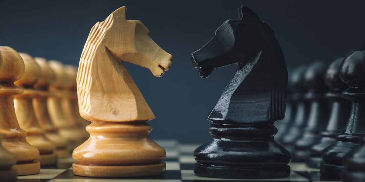 Two Pawns Facing Each Other on a Chess Board
