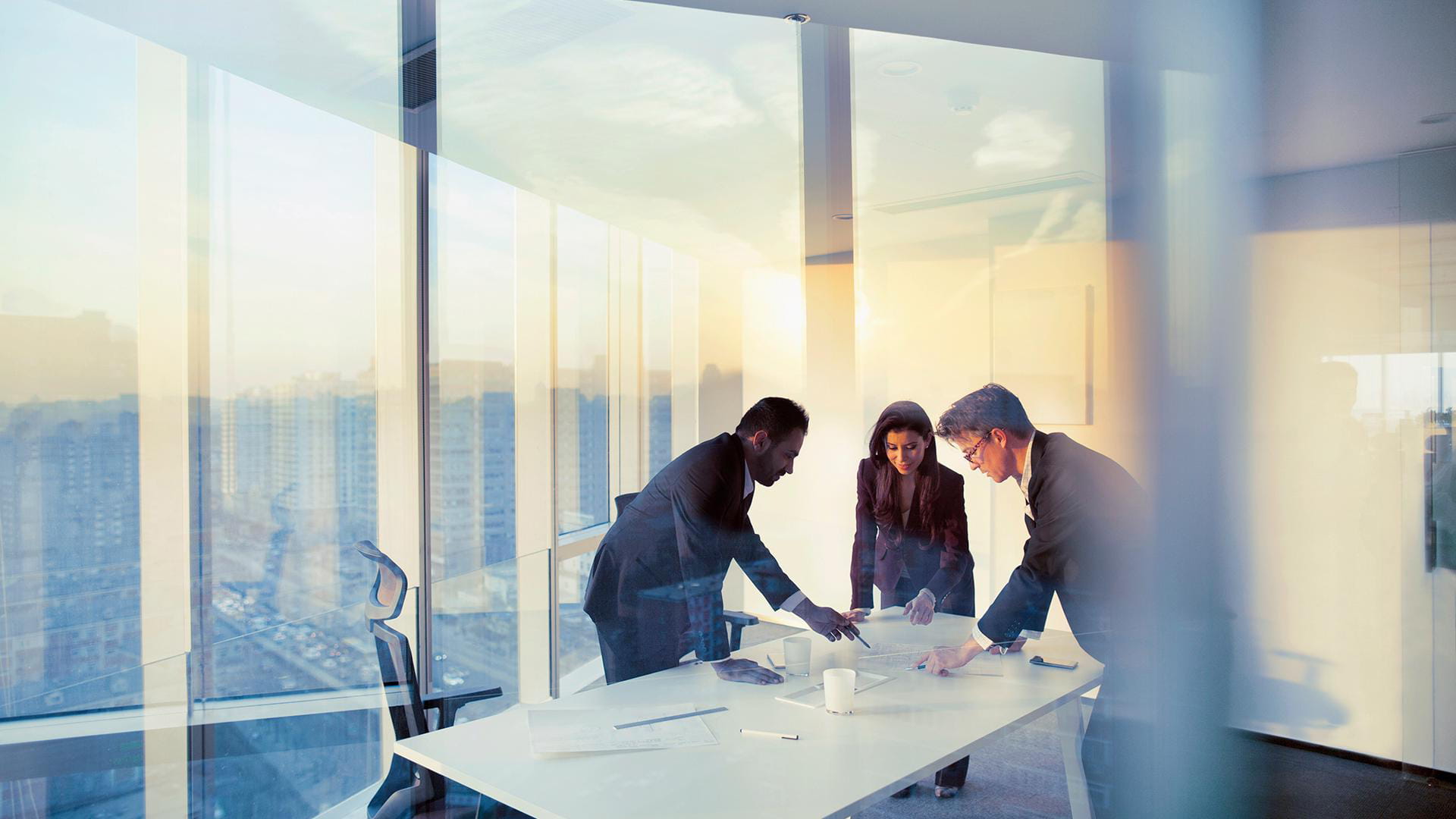 Business colleagues planning together in meeting - stock photo