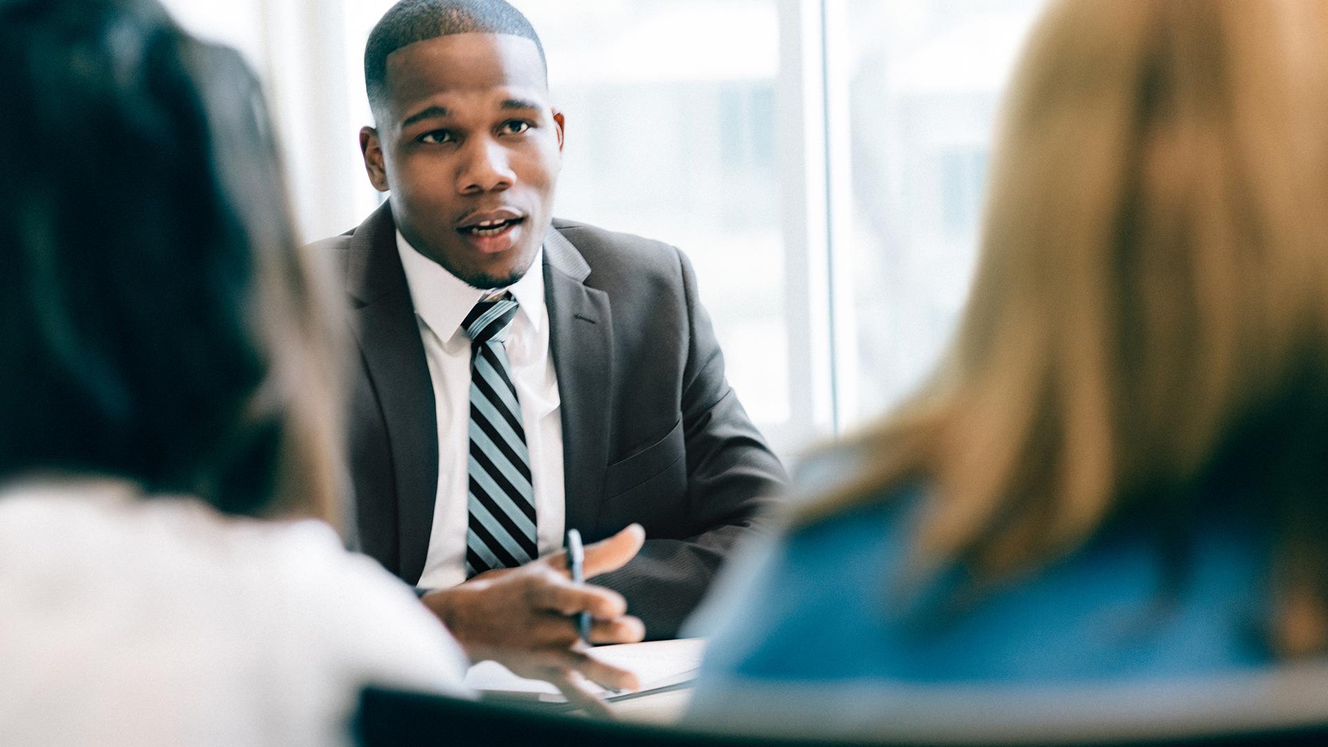 Two women at a meeting with a financial advisor