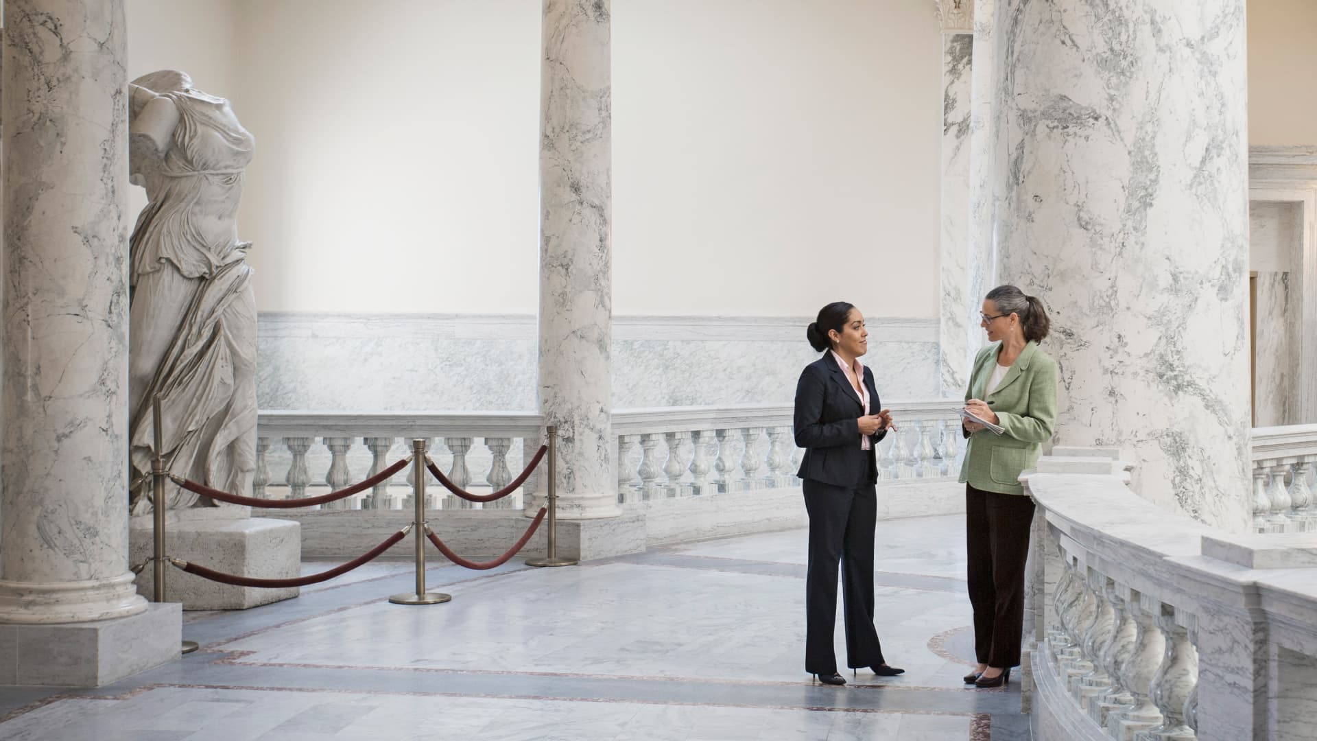 Politicians talking in government building