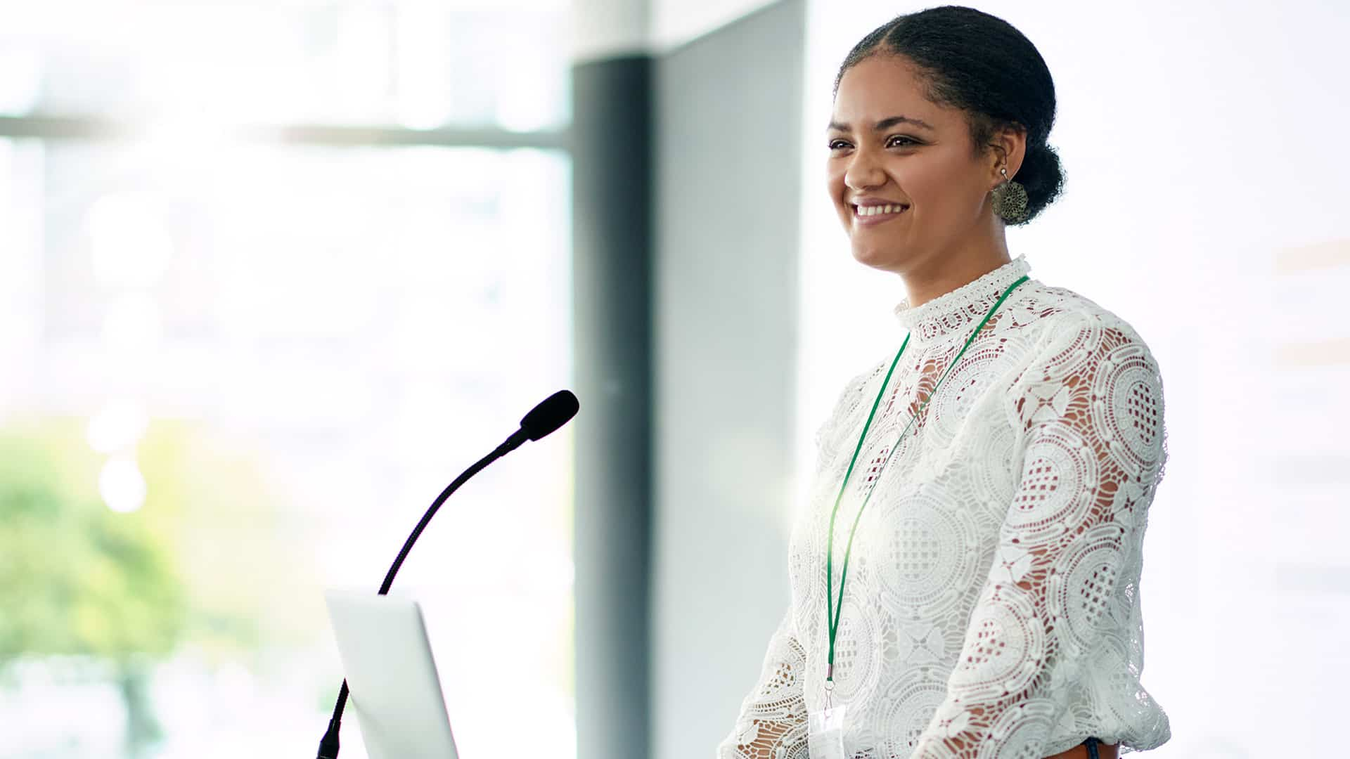 Shot of a young businesswoman delivering a presentation at a conference