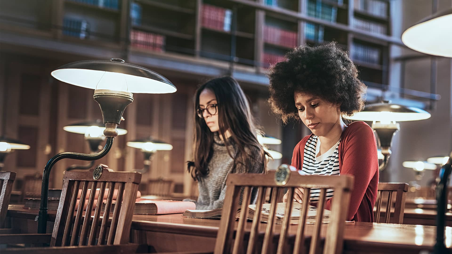 Students studying at a library