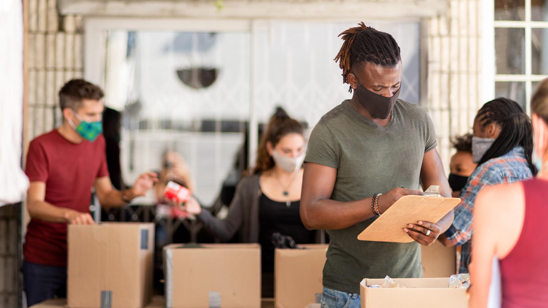 Nonprofit worker checking inventory